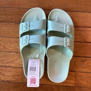 Freedom Moses sandals/slides. Brand new with tags. Women 10-10.5 men 8-8.5